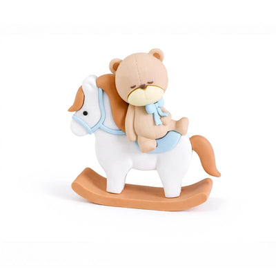 Sleeping teddy bear on rocking horse cake topper blue saddle